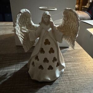 Elegant Angel Figurine with Cutout Design